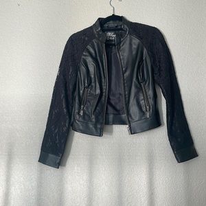 Women’s black leather jacket with lace.